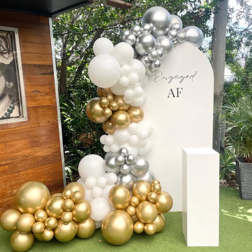 Engaged AF board, balloon garland & cake plinth
