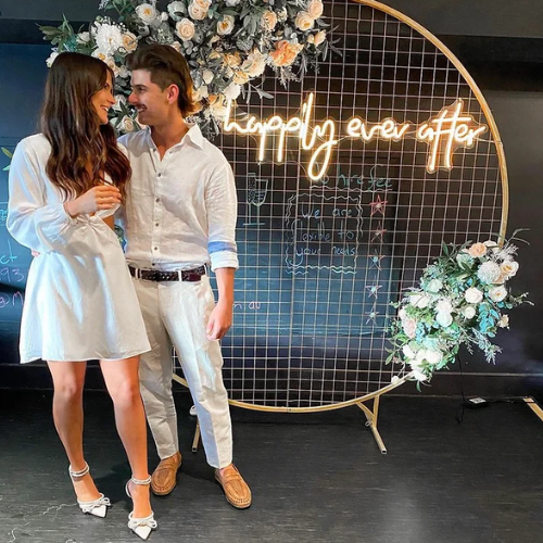 Mesh stand with flowers & Happily Ever After neon